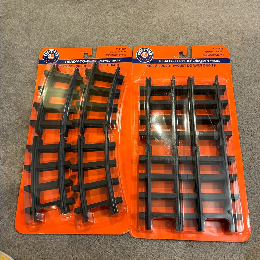 LIONEL TRACK.  2 packages of tracks. One straight and one curved.